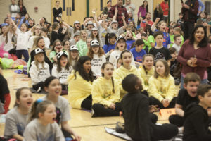 Kids cheering at battle