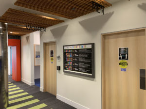 The two restrooms on the first floor were remodeled to increase capacity and updated ventilation. The restrooms doors have handicap accessible buttons.