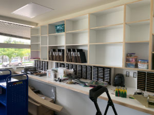 The opposite wall of the workroom includes storage space for the Youth department’s extensive die cut collection and a large counter for program preparation.