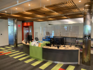 The new reference desk has space for two librarians and a built-in literature display area.