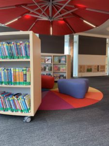 Play under the bright red canopy or browse the Beginning to Read books.