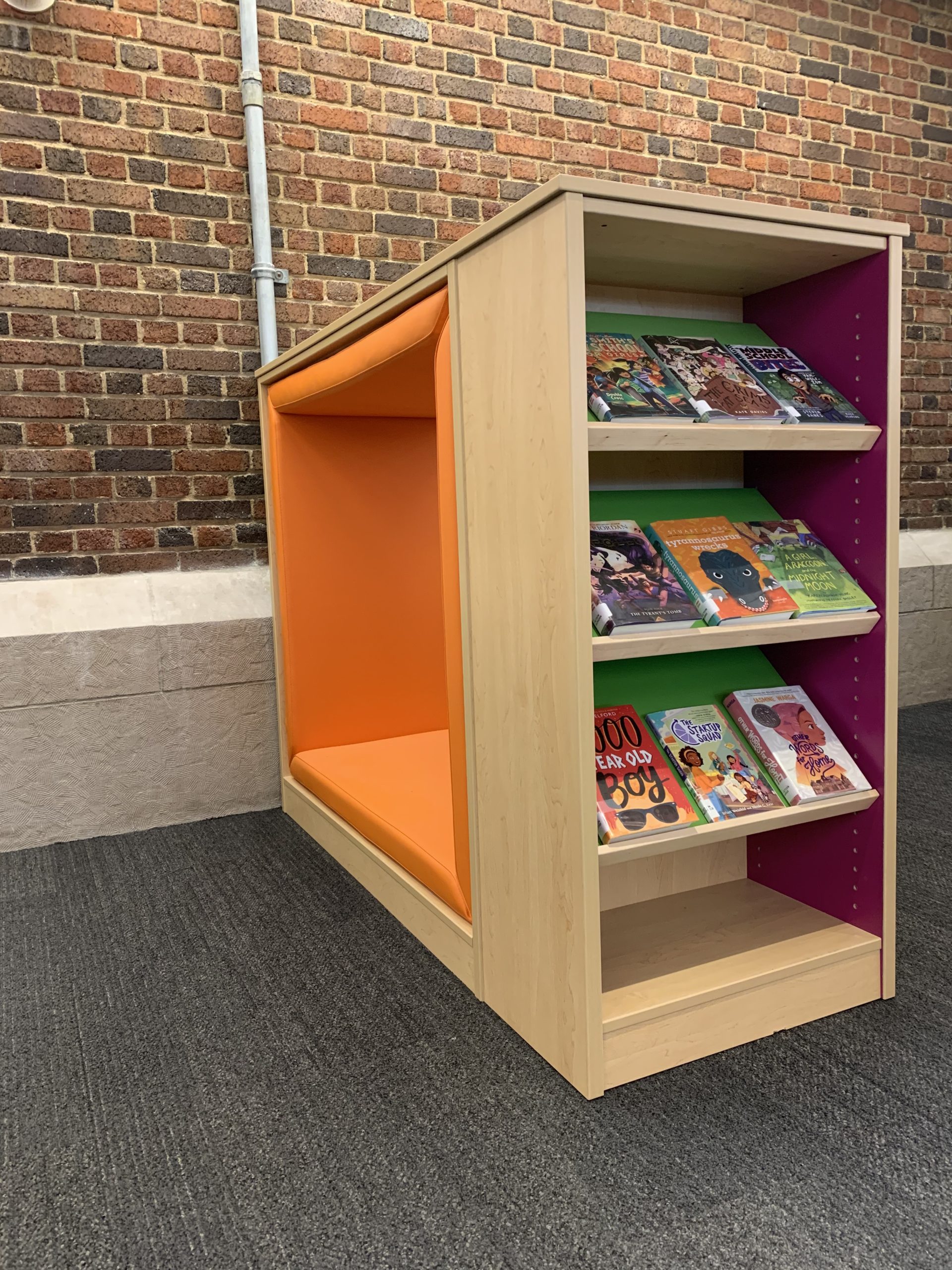 Several reading cubbies are scattered throughout the room.