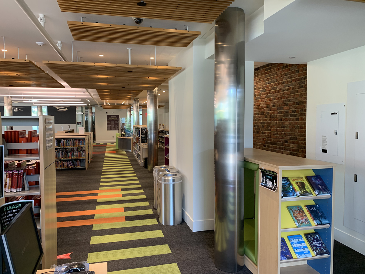 View looking south toward the reference desk and play area.