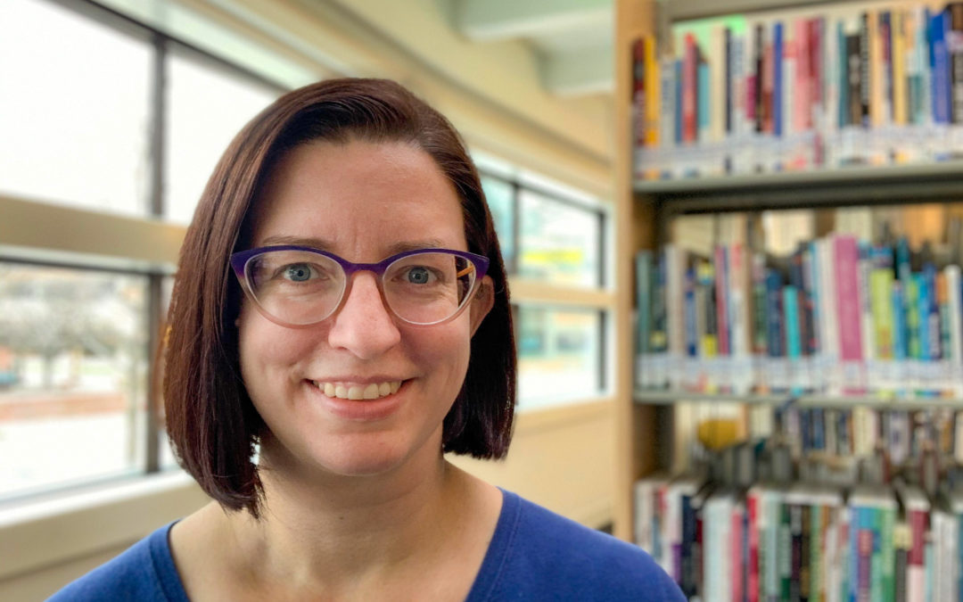 Rebekah Craft stands in the Adult Services wing of the Baldwin Public Library