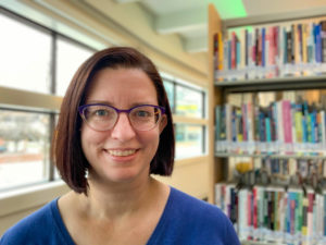 Rebekah Craft stands in the Adult Services wing of the Baldwin Public Library