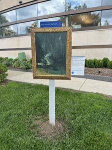 Photo of a replica of Nocturne in Black and Gold, the Falling Rocket, by James Abbot McNeil Whistler installed outside BPL