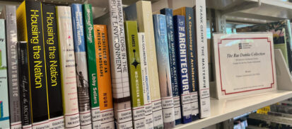 100 Essential Architecture books on a Metal Shelf