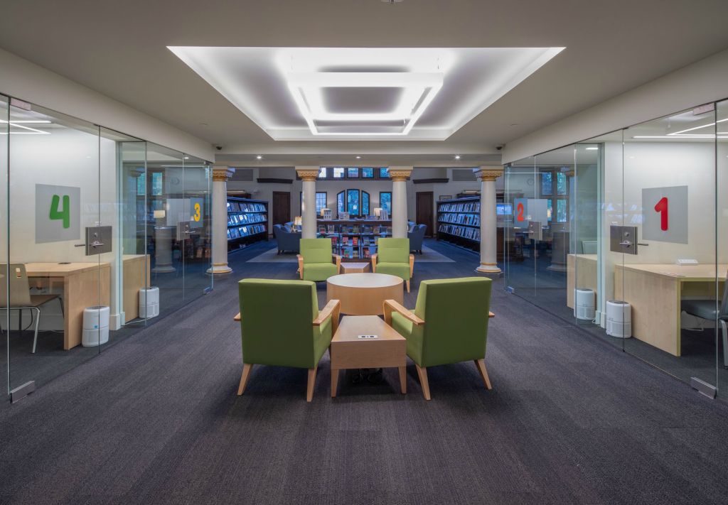 glass-walled study rooms