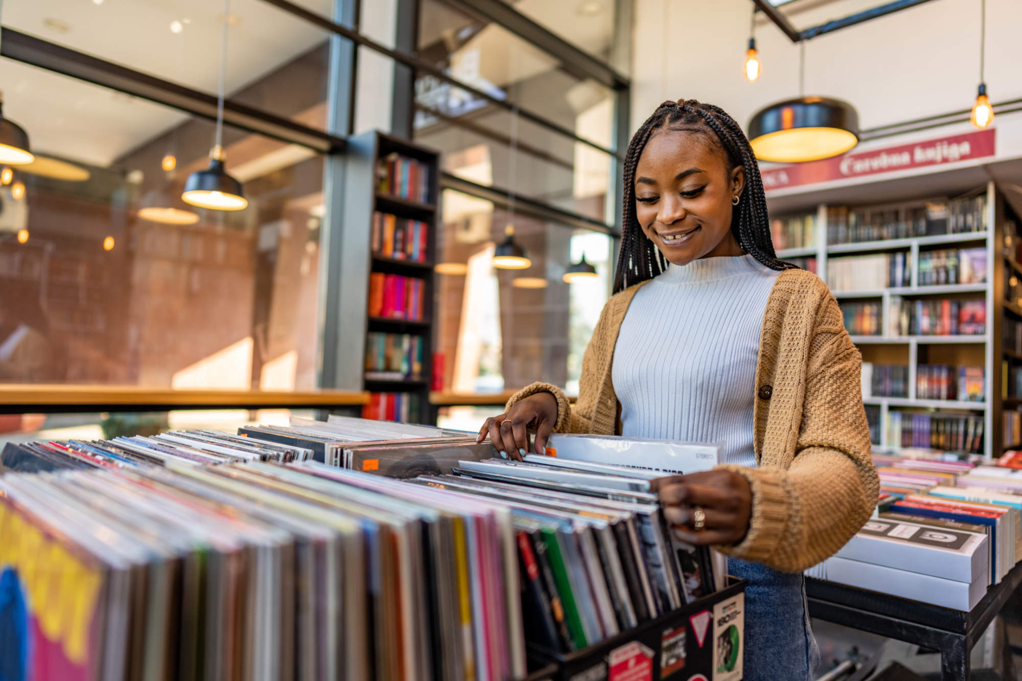 Woman looking through record albums
