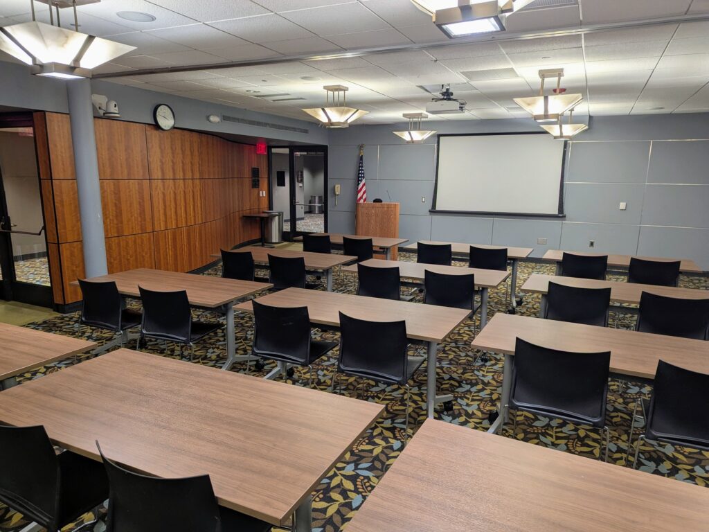 Rotary Tribute & Donor Room set up with tables and chairs, classroom style.