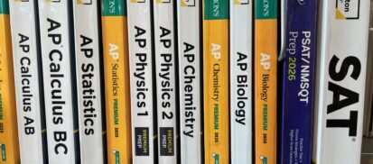 Row of test prep books on shelf