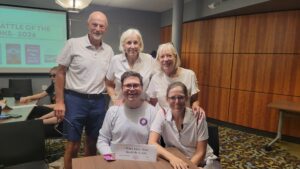 group of five in white shirts